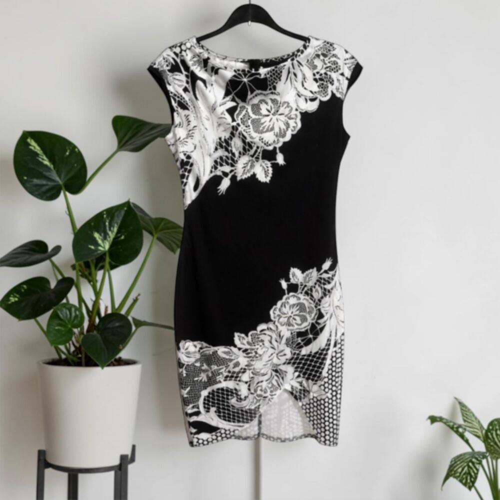 Elegant Black & White Floral Print Midi Dress with Asymmetrical Hem